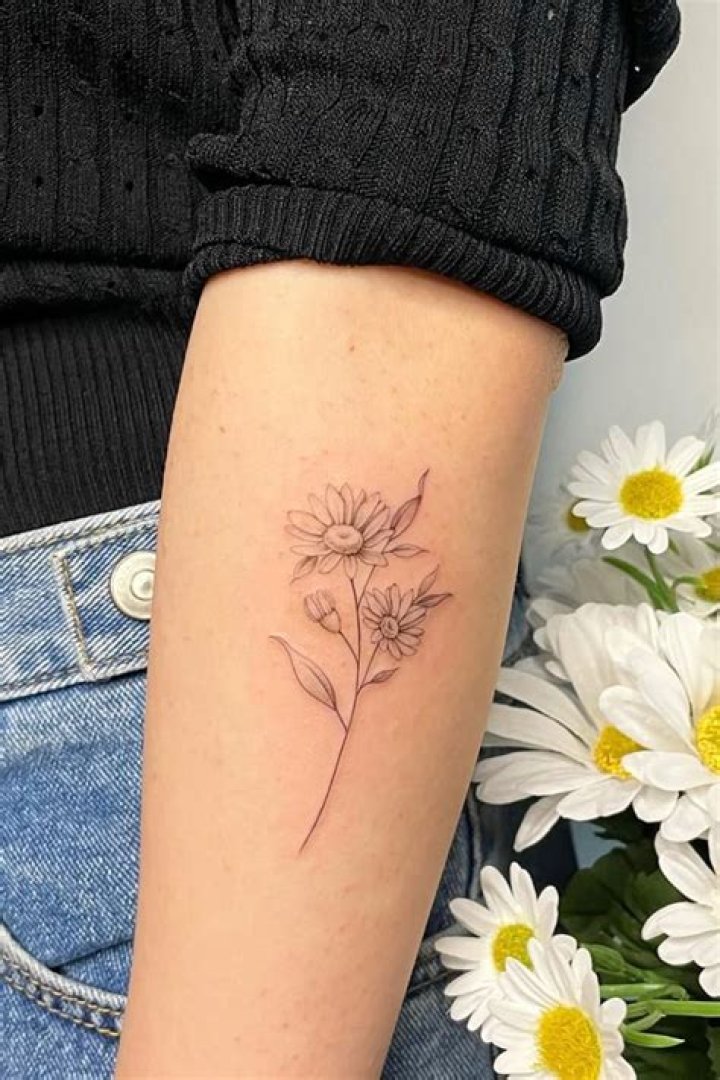 Exploring the Art and Meaning of Name Daisy Tattoos